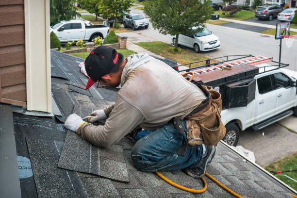 Professional Metal Roofing technician working in Ballouville, CT
